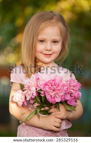 https://image.shutterstock.com/display_pic_with_logo/616699/285329516/stock-photo-beautiful-baby-girl-with-pink-flowers-outdoors-little-girl-year-old-285329516.jpg