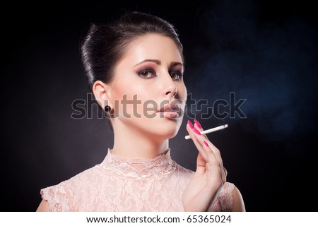 Charming lady smoking cigarette