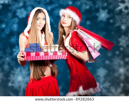 sexy Snow Maiden with New Year\'s gifts