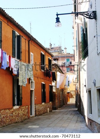 A back street in Venice Italy with clothes hanging out to dry