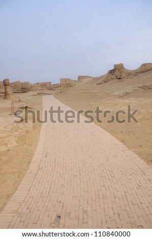 stone road in xinjian desert,china