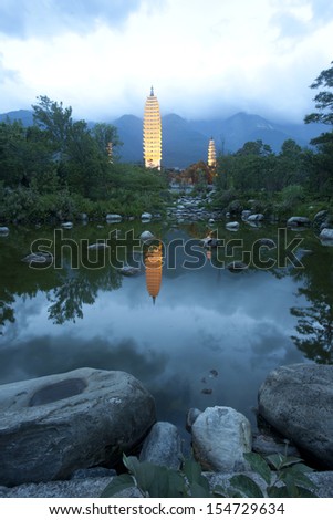 Dali three white pagodas and Cangshan Mountain in the night,dali,yunnan