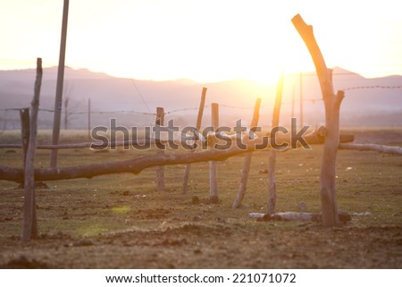 Sunset over horse fence,north China