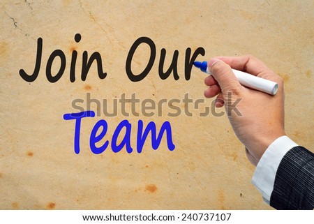 Businessman writing join our team. Business concept