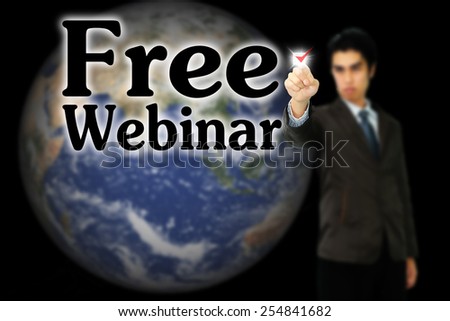 Business man pointing to transparent board with text: Free Webinar