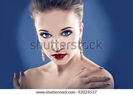 Perfect girl with blue eyes and earrings