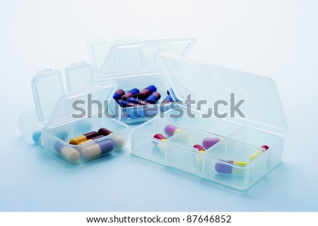 Pills in Pill Boxes in Blue Cast