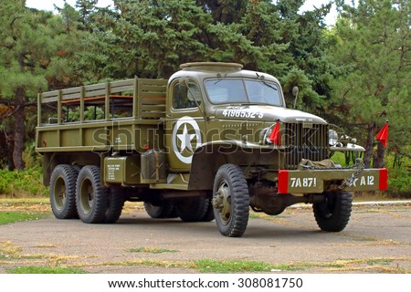 MARIUPOL, UKRAINE-SEPT 9:GMC CCKW 353 Flatbed truck US Army, historical reenactment of WWII, September 9, 2013 in Mariupol,Ukraine