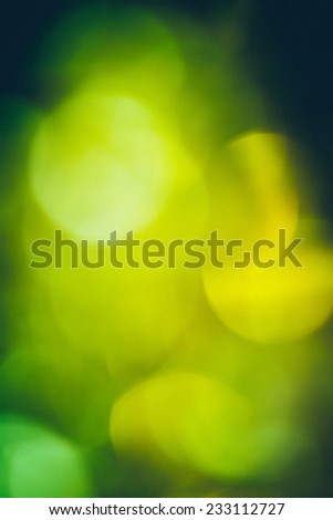 Abstract Festive background.Christmas and New Year feast bokeh background with copyspace. Holiday party background with blurry boke special magic effect.. Vintage effect. Retro grainy color film look.