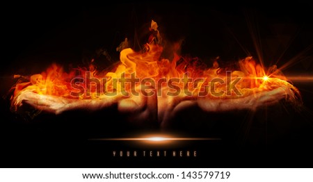 Beautiful and muscular black man\'s back on fire in dark background