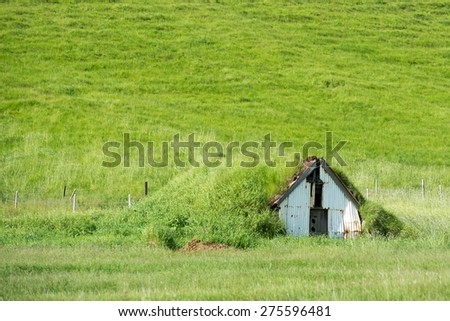 Old turf house isolated in Icelandic country