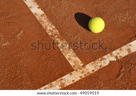 Detail of a clay court with tennis balls