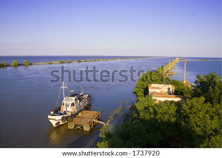 Danube river flows into Black Sea and pilot boat