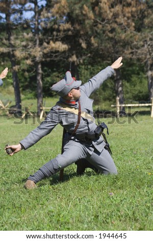 Soldiers from first world war launching a grenade on a demonstrative show