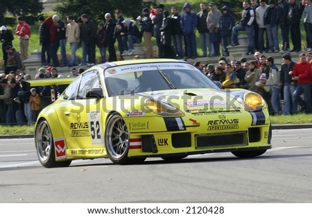 Yellow Race car at a demonstrative show in Bucharest Ring Tour