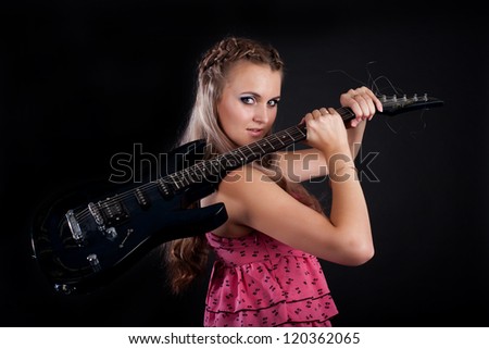 Blonde with electric guitar