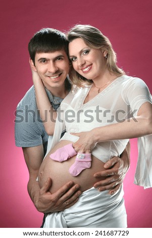 young family waiting for baby, pregnancy. family joy and happiness. love. caring for a baby