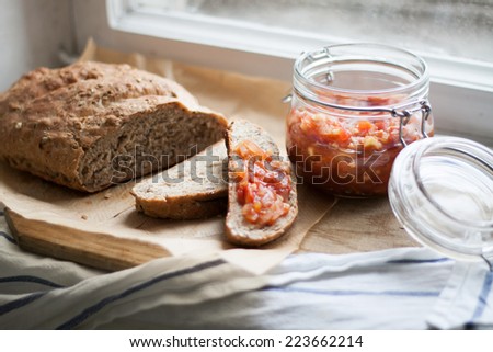 freshly baked multigrain bread with tomato sauce, garlic, ginger and onions