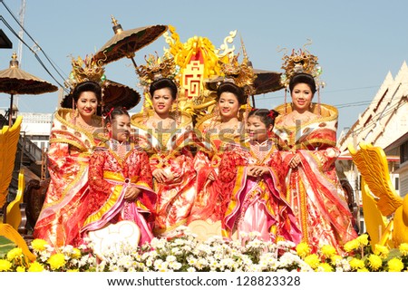 NAKORNSAWAN,THAILAND-FEB 13 : Unidentified beautiful woman  is Fairy or Angel on the parade during Chinese New Year celebrations on February 13, 2013 in Nakornsawan city,Middle of Thailand.
