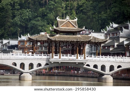 FENGHUANG, CHINA - JUNE 9 : Pavilion on bridge in old city on June 9, 2015 in Fenghuang, Hunan, China.This ancient town was added to the UNESCO World Heritage Tentative List in the Cultural category.
