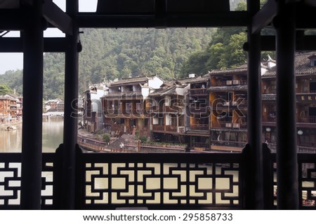 FENGHUANG, CHINA - JUNE 9 : Scenic view of the old town on June 9, 2015 in Fenghuang, Hunan, China.This ancient town was added to the UNESCO World Heritage Tentative List in the Cultural category.