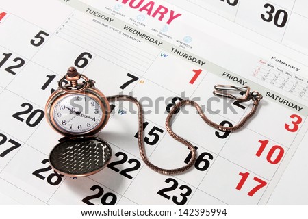 Pocket Watch on Calendar