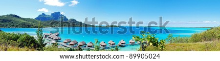Panorama view of over water bungalow in Bora Bora , the famous island of French Polynesia , south Pacific .