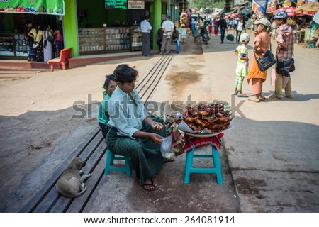 MON STATE, MYANMAR - MARCH 03 : Unidentified Vendors selling foods and souvenir at Kyaiktiyo old market, This market is entrance of Golden Rock Pagoda on March 03, 2015 in Mon State, Myanmar.
