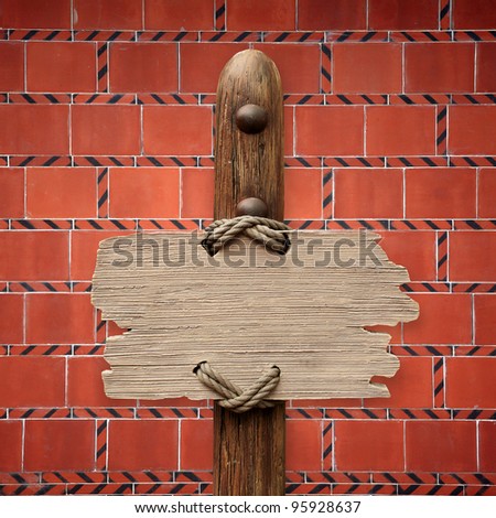 wood sign on brick wall background