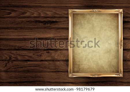 vintage portrait frame on old wooden background