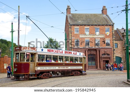 BEAMISH, UK - JULY 27, 2012 - A tram in the high street of the Edwardian town that forms part of Beamish Museum in County Durham, England.