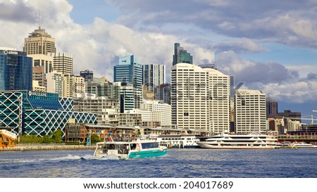SYDNEY, AUSTRALIA - MAY 20, 2010: Apartment and office blocks overlook Darling Harbour, a harbour and recreational and pedestrian precinct adjacent to the city centre of Sydney in New South Wales.