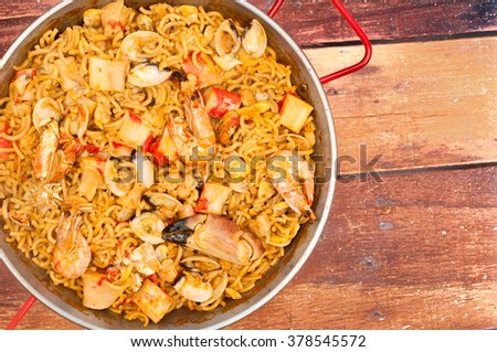 Similar – Image, Stock Photo Pan with tasty fideua dish on table