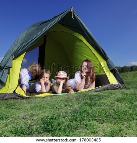 happy family in tent