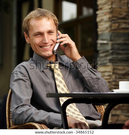 businessman to speak on telephone