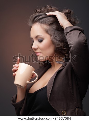 Beauty girl with coffee cup