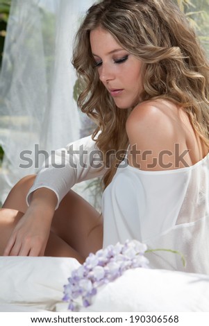 young sensual blond woman in chill out ambient