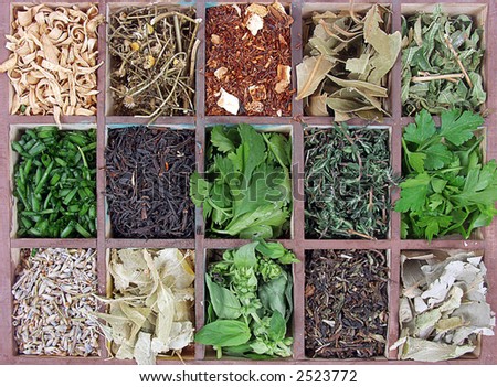 Assortment of herbs and aromas for prepare tasty food on wooden box.