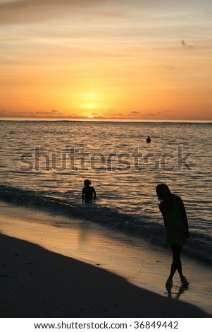 sunset at paradise beach at island of maldives