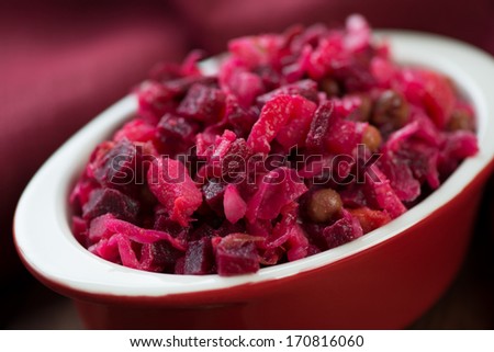 Russian salad made of beetroot and variety of other vegetables