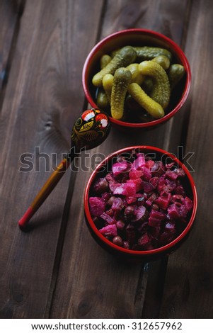 Russian vinaigrette with beetroot, pickles and mix of other vegs, studio shot