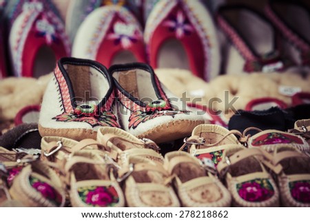 Handmade shoes made of leather decorated with the traditional way a very well known in the area of Zakopane in Poland.