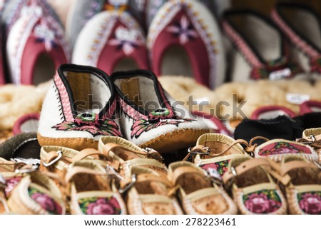Handmade shoes made of leather decorated with the traditional way a very well known in the area of Zakopane in Poland.
