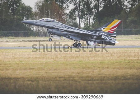 RADOM, POLAND - AUGUST 23: Belgian Air Force F-16 makes its show during Air Show Radom on August 23, 2015