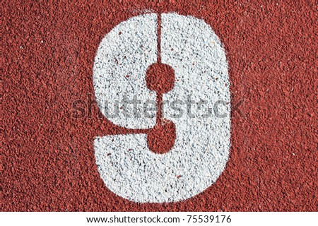 Number nine on the start of a running track - check my portfolio for other numbers