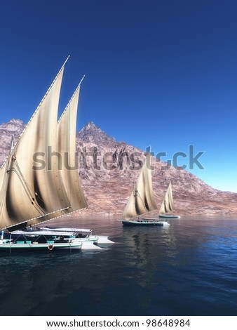 Group of Fellucas sailing in the Nile river at sunshine in Aswan