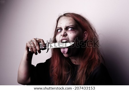Girl possessed by a devil cuts tongue