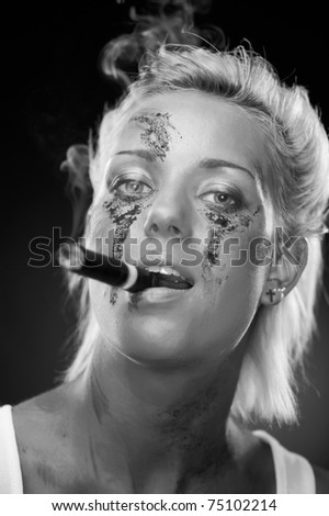 Attractive blonde smoker girl, studio shot, black and white