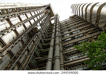LONDON, UK - JULY 1, 2014: The Lloyd's Building, also known as The Inside-Out Building, home of insurance institution Lloyd of London. Like Pompidou Centre in Paris Lloyd was designed by Rogers 1986.