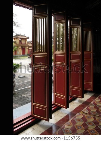 Doors, with view of courtyard and gate in Forbidden Purple City, Hue, Vietnam